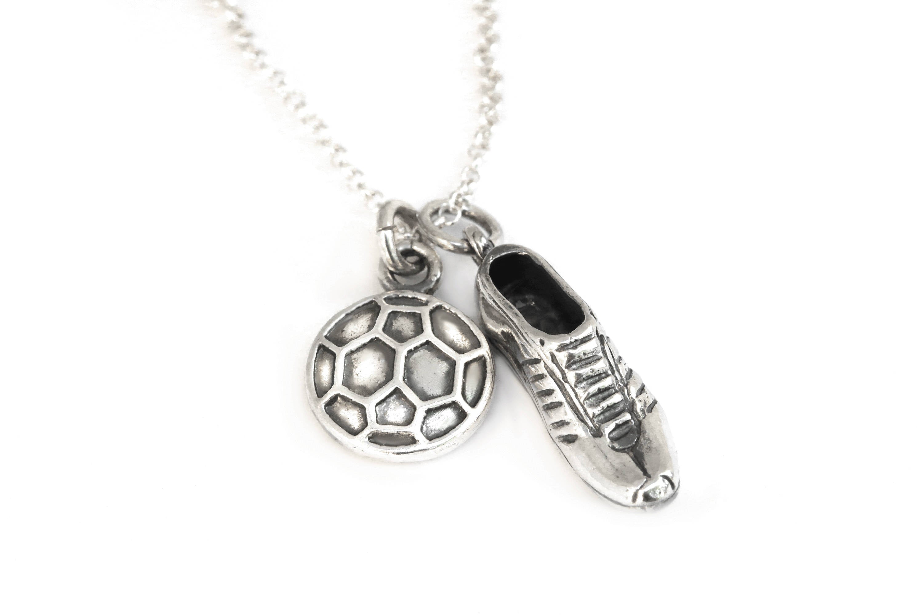 Fußball-Silberschuh und Ballhalskette